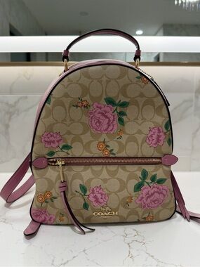 Coach Beige Signature Canvas Backpack with Pink Floral Accents